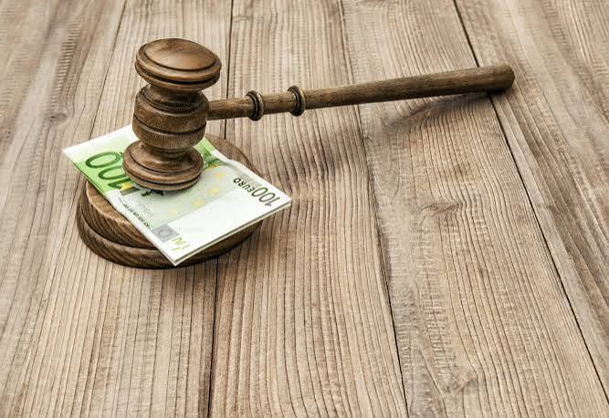 Auctioneer Hammer photo courtesy Unsplash